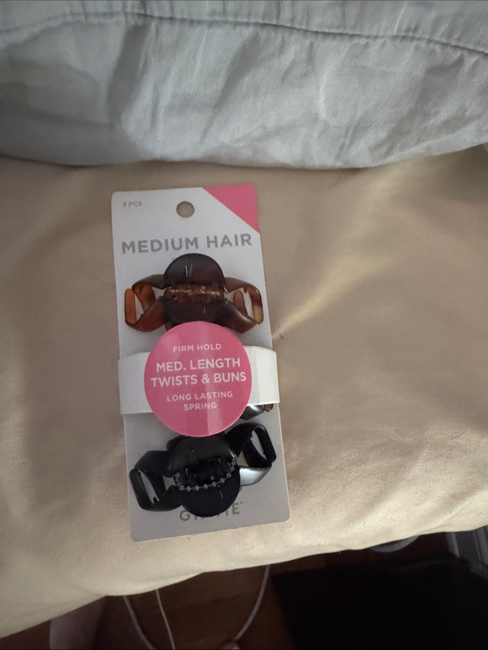 Medium Hair Twist & Bun Claw Clips - Black and Brown. There are 3 clips